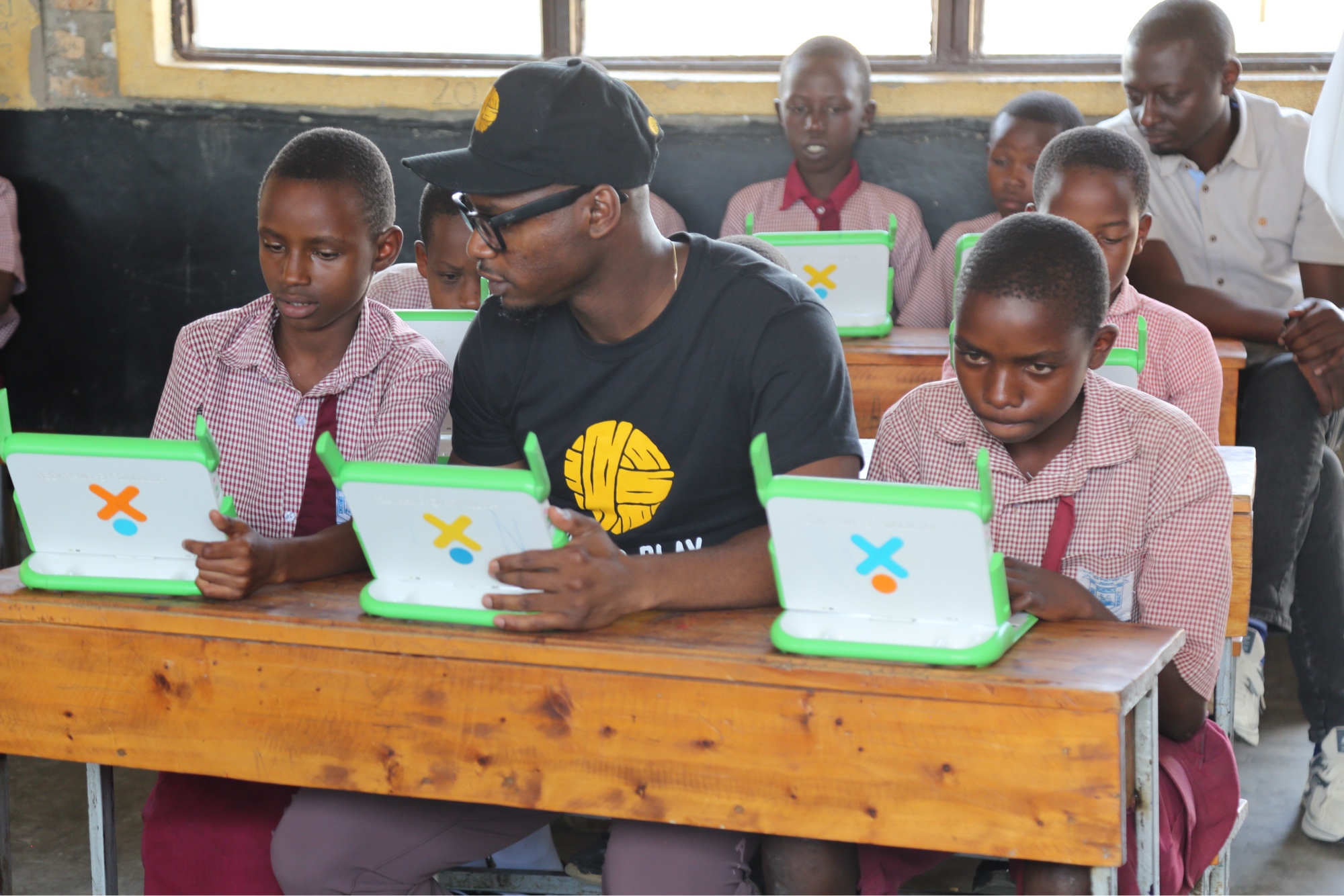 Duan Asemota with students in Rwanda, November 2025