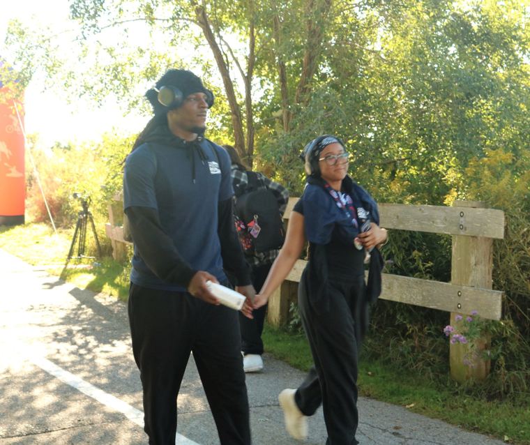 Two participants on the trail