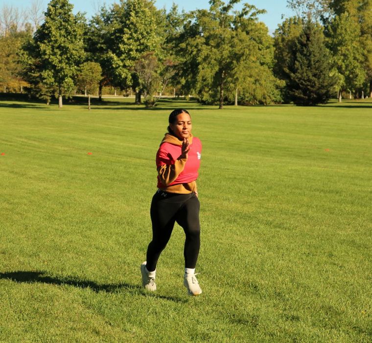 Sprinter in a red and orange top