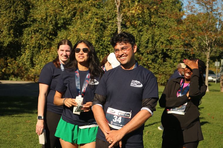 Group of participants smiling on the lawn