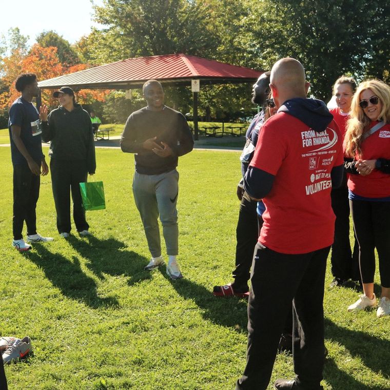 Volunteers and participants gathered near the gazebo