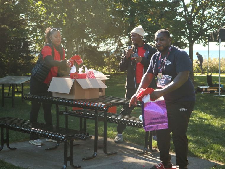 Gift bags being presented at the table